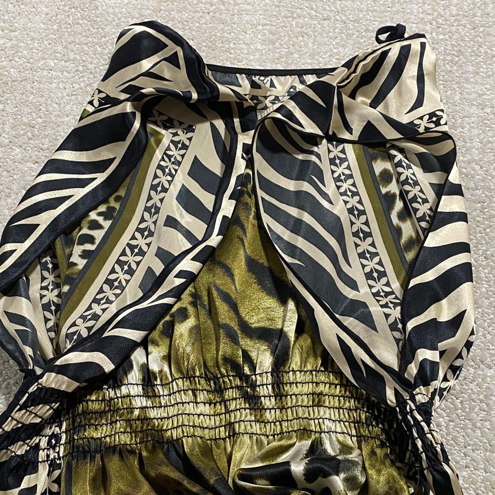 Chic Animal Print Blouse with Zebra Accents - Picture 15 of 16